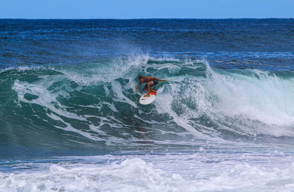 Surfer in a west-coast barrel. Photograph by Surfing Croyde Bay.